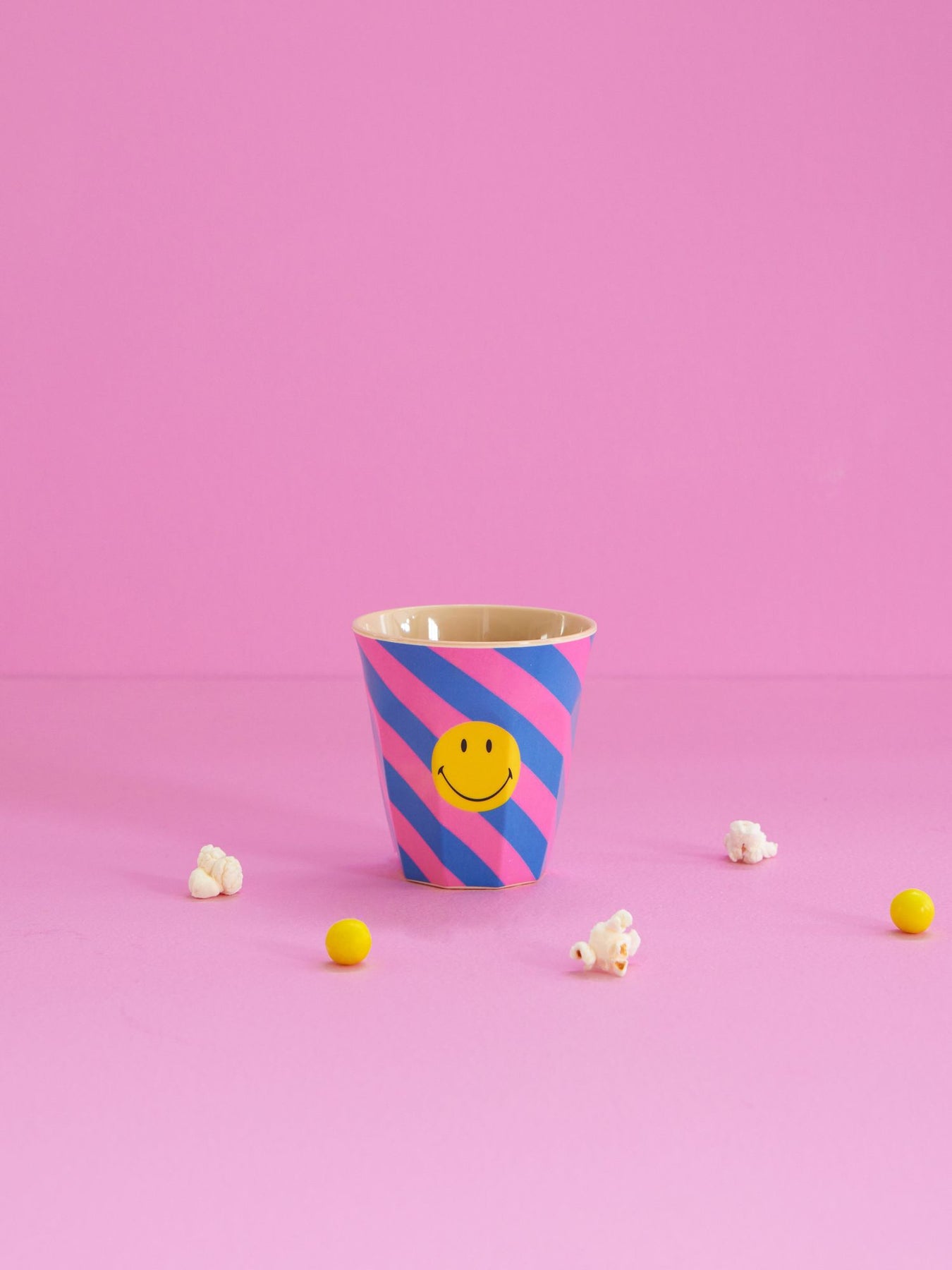 MELAMINE CUP WITH STRIPED SMILEY PRINT