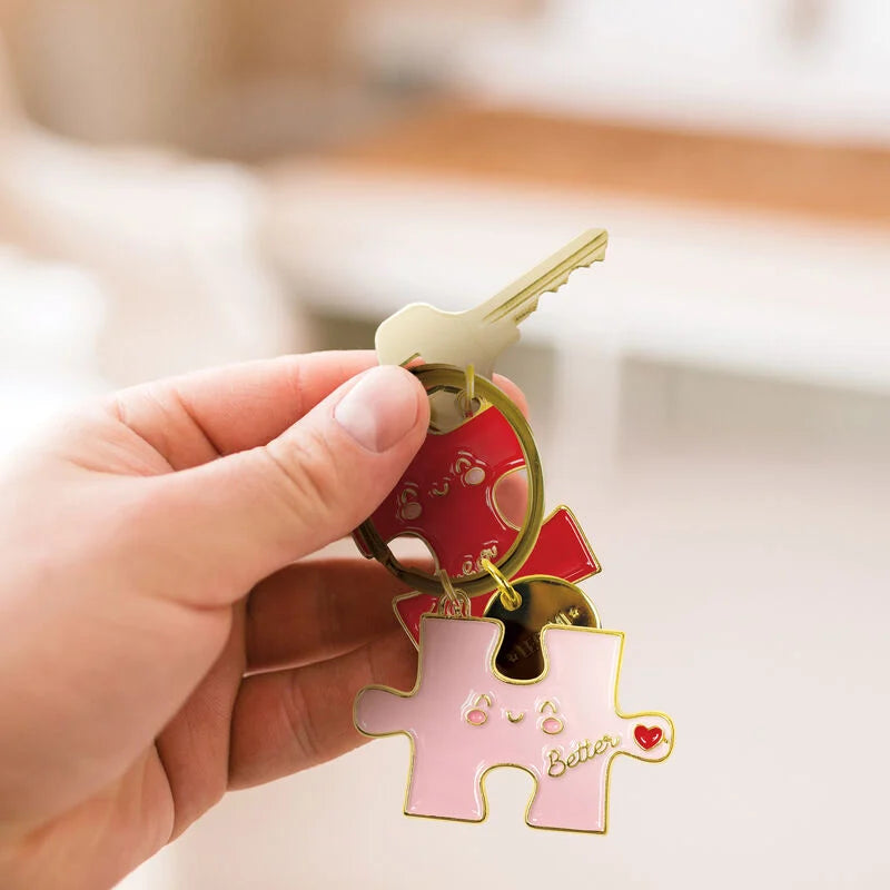 portachiavi metallo smaltato set da due - what a key ring! puzzle