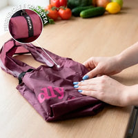 BORSA PER LA SPESA PIEGHEVOLE - SHOPPING BAG "TOTALLY ESSENTIAL STUFF OBVIOUSLY"